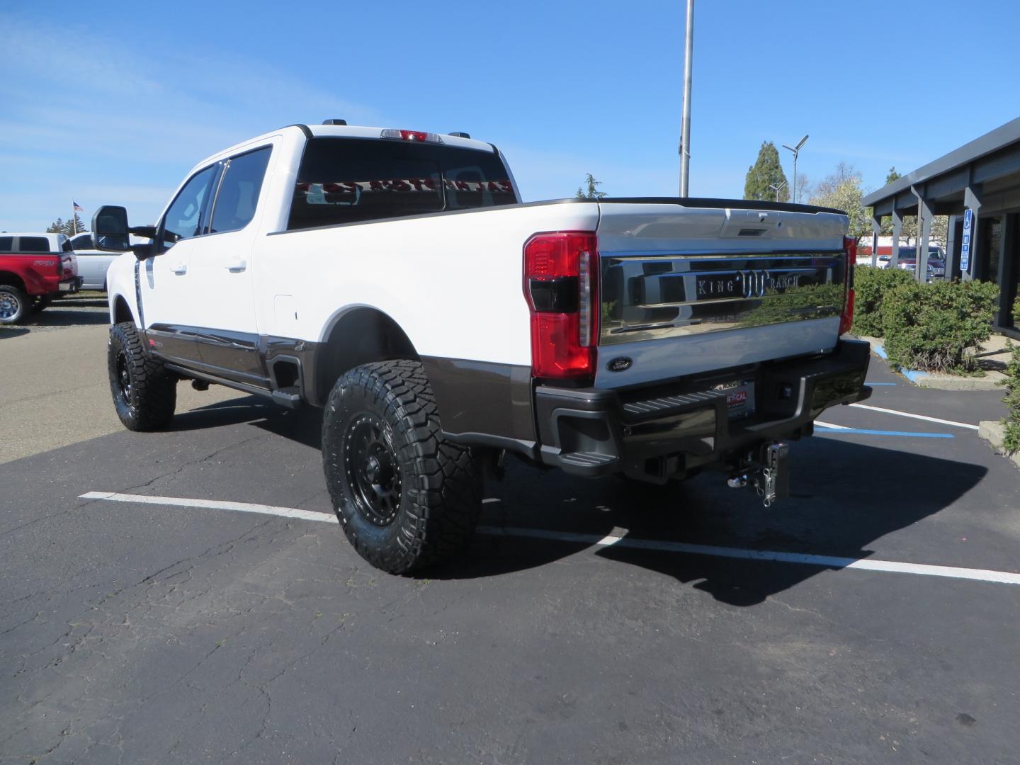 2024 White /BROWN Ford F-250 SD King Ranch Crew Cab 4WD (1FT8W2BM0RE) with an 6.7 HI OUTPUT POWER STROKE engine, 10-SPEED AUTO TORQSHIFT transmission, located at 2630 Grass Valley Highway, Auburn, CA, 95603, (530) 508-5100, 38.937893, -121.095482 - New 24 King Ranch featuring a BDS 3" radius arm suspension system, Fox 2.5 Performance Elite series shocks, Fox ATS steering stabilizer, 37" Nitto Ridge Grappler tires, 18" Method MR315 wheels, 2wd front bumper valance, B&W Tow and Stow hitch, and a Bolt Lock. - Photo#6